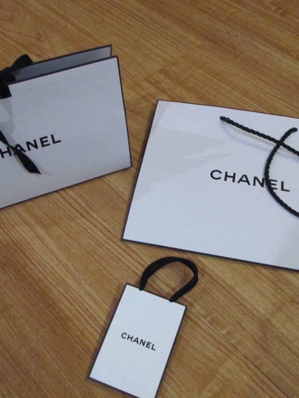 CHANEL 3 piece bag set including specialty triangle box,mini, shopping bag